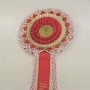7 layer rosette For Baltian champion, stars and lace with hand lettering and added tail ribbon